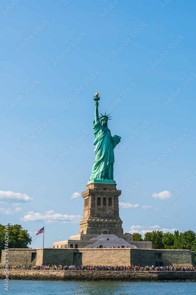 Fototapeta premium The statue of Liberty with blue sky background.