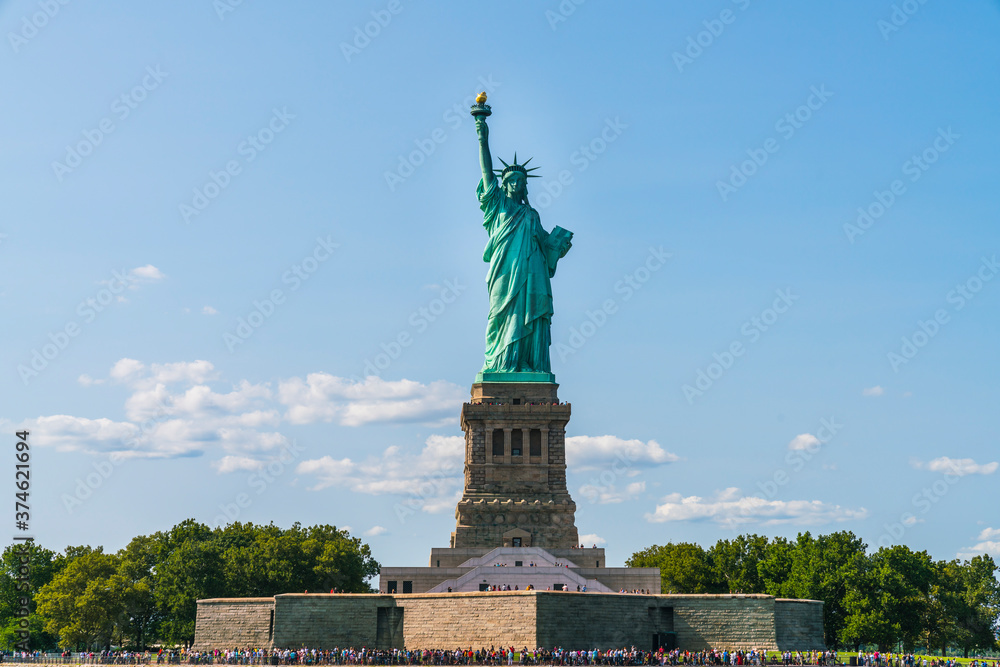 Fototapeta premium The statue of Liberty with blue sky background.