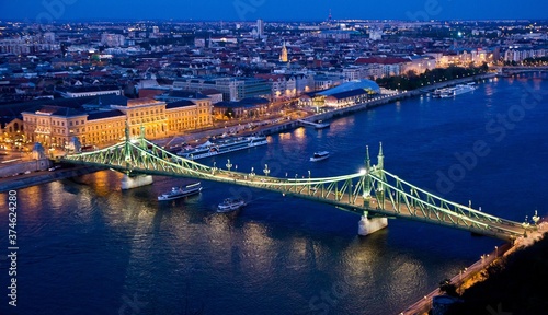 Beautiful view of Liberty Bridge at night. It was built in 1896 and rebuilt in 1945 and connects Buda and Pest across the River Danube. Budapest, Hungary.