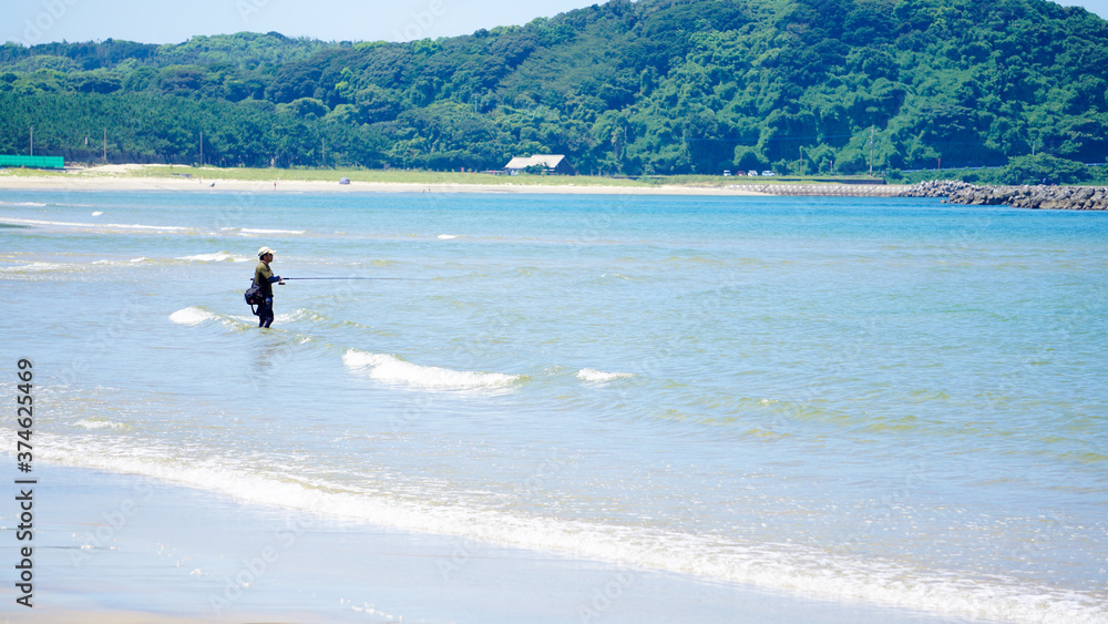 釣り人と青い海 釣り人と青い海