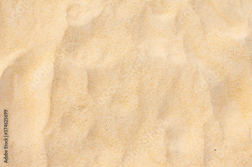 Sand texture as background in summer sun