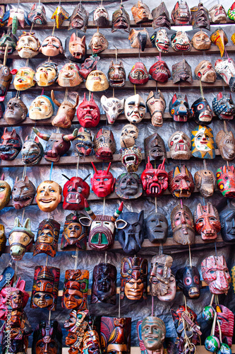 Different ethnic masks for sale on a market  Antigua Guatemala