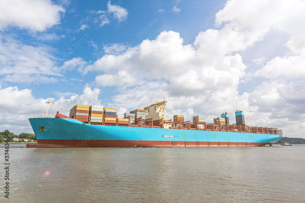 Large container vessel on the Elbe river in Hamburg, Germany
