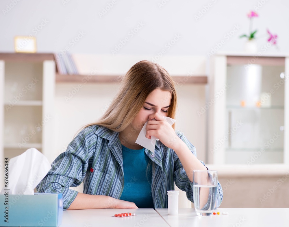 Woman taking pills to cope with pain Woman taking pills to cope with pain