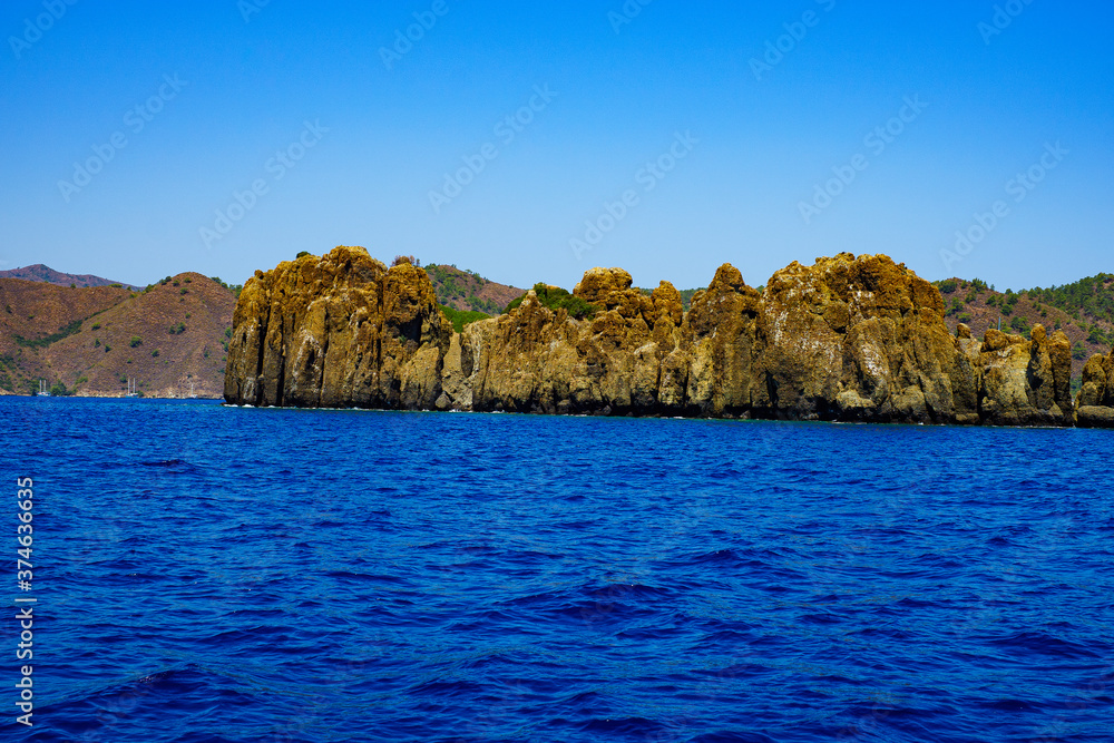 an island of volcanic lava on the high seas