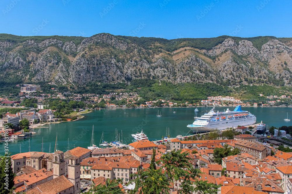 A cruise ship moored at the harbour in the old town in Kotor, Montenegro