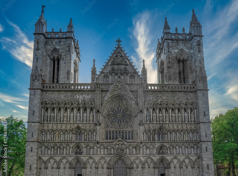The imposing facade of the Nidaros Cathedral, Trondheim, Trondelag, Norway. Built 1070-1300 AD in romanesque and gothic styles over the burial site of St. Olav. Consecration site for Norwegian kings