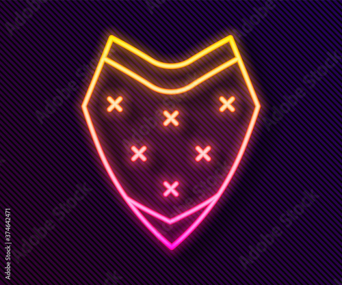 Glowing neon line Traditional mexican poncho clothing icon isolated on black background. Vector.