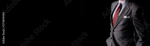man, businessman on a black background with space for text