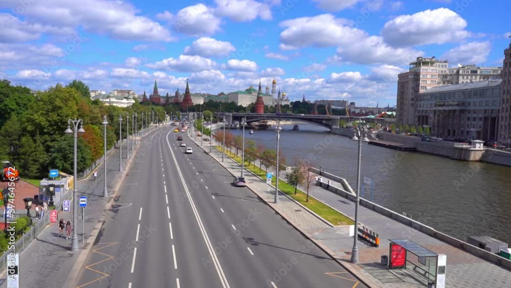 Moscow / Russia - 17 Aug 2020:  Video of panorama of the city of Moscow, a view of the moving traffic flow and the river on a Sunny summer day
