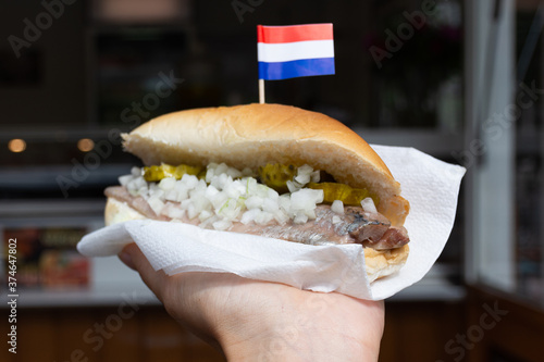 Photography Dutch herring sandwich in Amsterdam