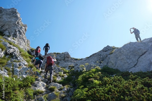 Silhouette of turists on trail in beautiful National Park Risnjak, Croatia