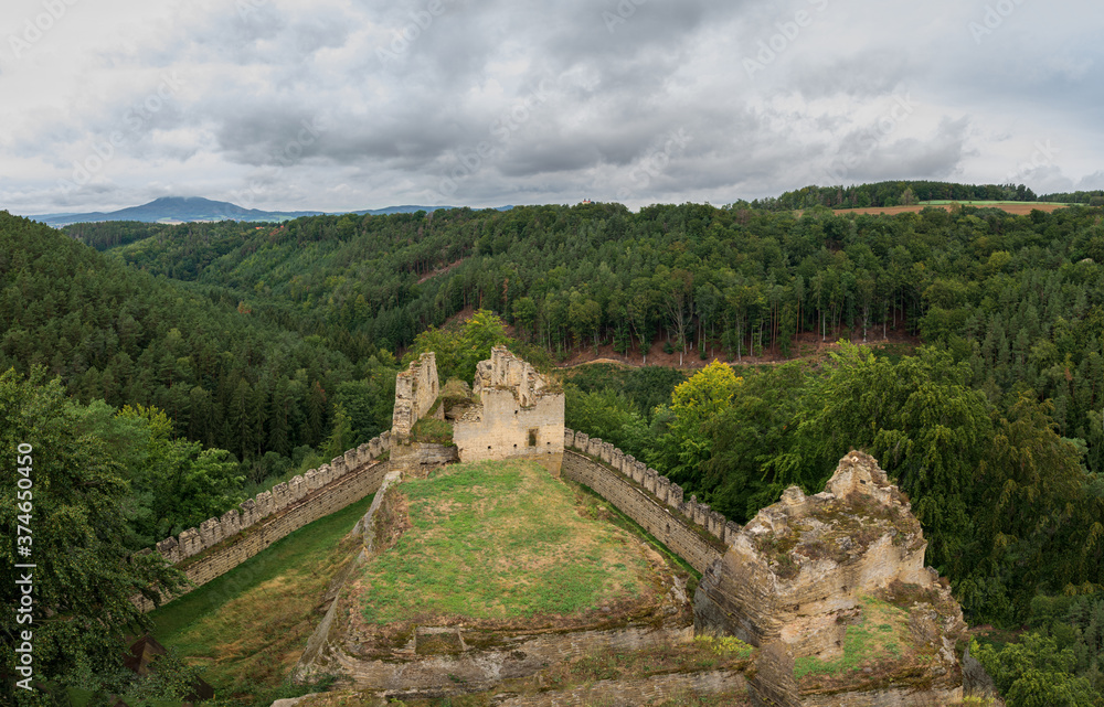view from the tower of castle Helfenburk u Usteka on the castle ruins and the surrounding hills
