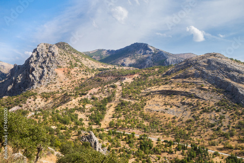 Panoramic view onto Taurus mountains & montane valleys in Kahta district, Turkey. Picture taken from mountain in ancient city Arsameia photo