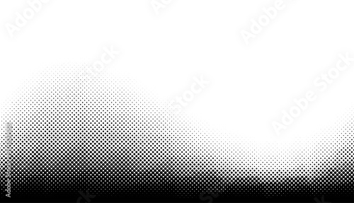 Abstract halftone monochrome dotted pattern.