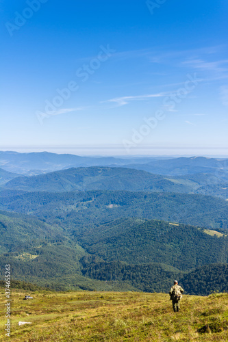 Traveling by the Carpathians. Polonyna Runa, Gostra, and other peaks. Spring, Summer and Autumn rest in the Carpathians. Green, Blue colors. Forest and meadows.