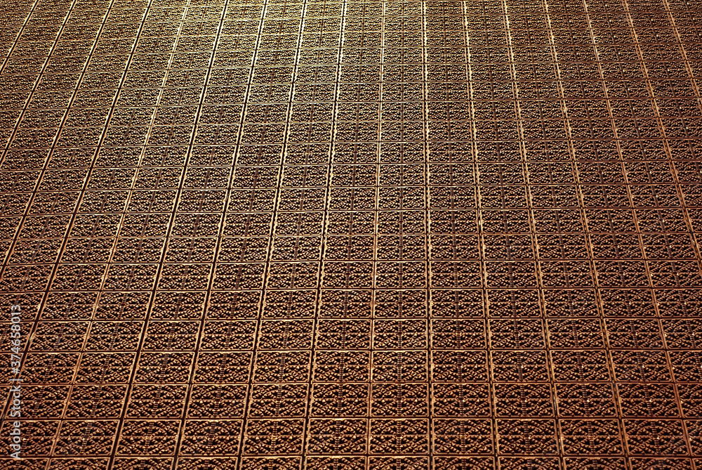 Fototapeta premium Red rubber coating for basketball and sports grounds. Texture of artificial floor close up.