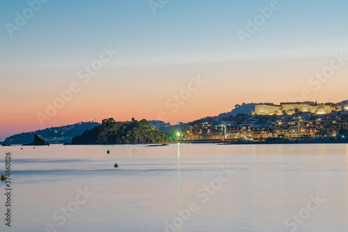 Views of Almuñecar with its Arabian castle and its rocks at nightfall. Long exposure.