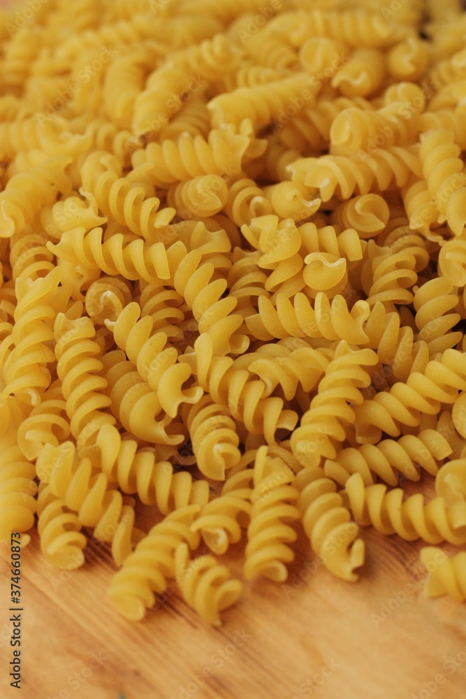 Durum macaroni on a wooden table macro Durum macaroni on a wooden table macro