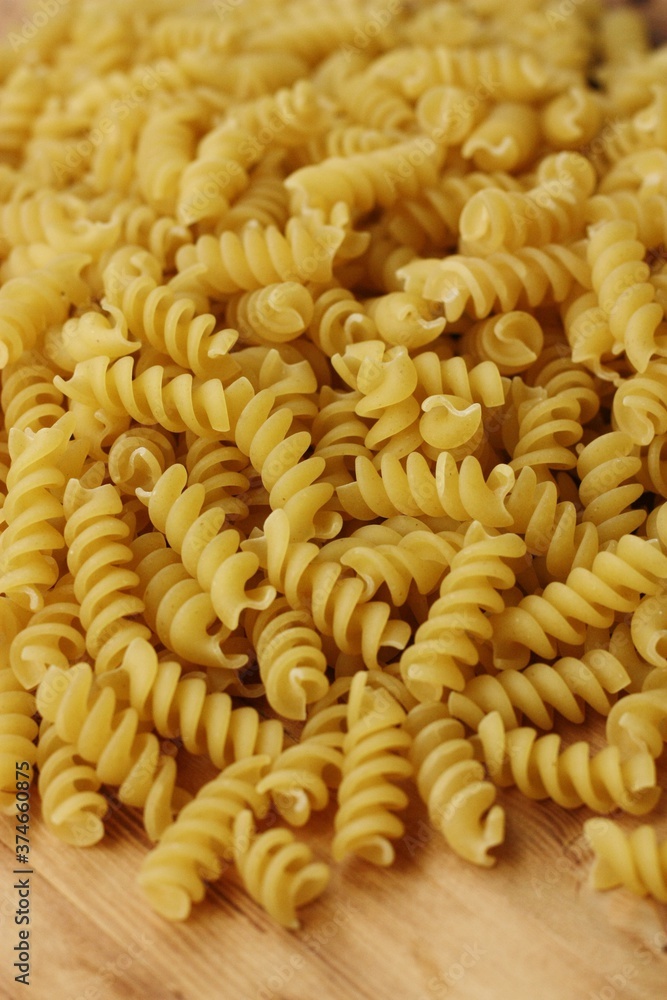 Durum macaroni on a wooden table macro Durum macaroni on a wooden table macro