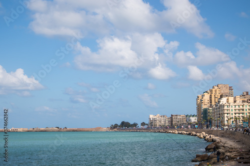 view of alexandria city with The Mediterranean Sea coast and old buildings with clouds at back ground and blue sky
