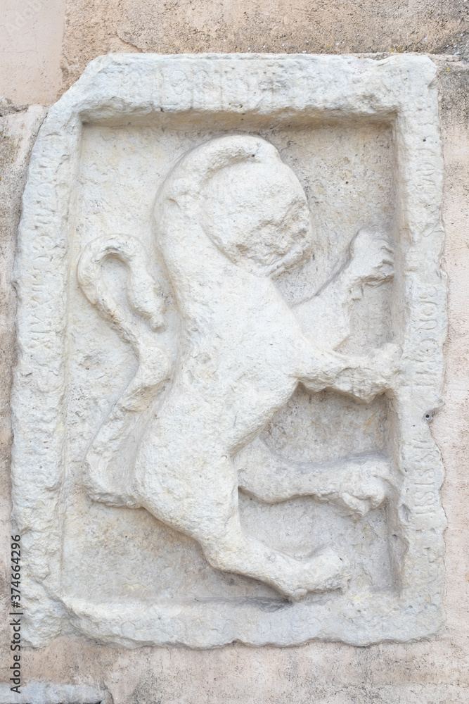 ancient stone relief. Toscany, Italy ancient stone relief. Toscany, Italy