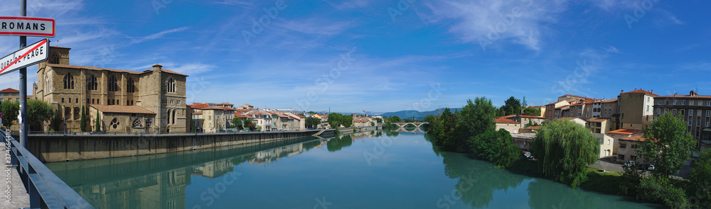 Panoramic view of the Isere river on the Old Bridge connecting Romans-sur-Isere to Bourg de Peage
