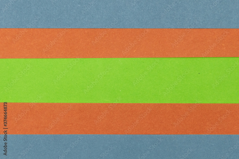 Fototapeta premium Green, Orange and Blue coloured paper background