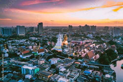 Photography Aerial view of Wat Paknam Bhasicharoen, a temple, pagoda and Buddha statue in Ba
