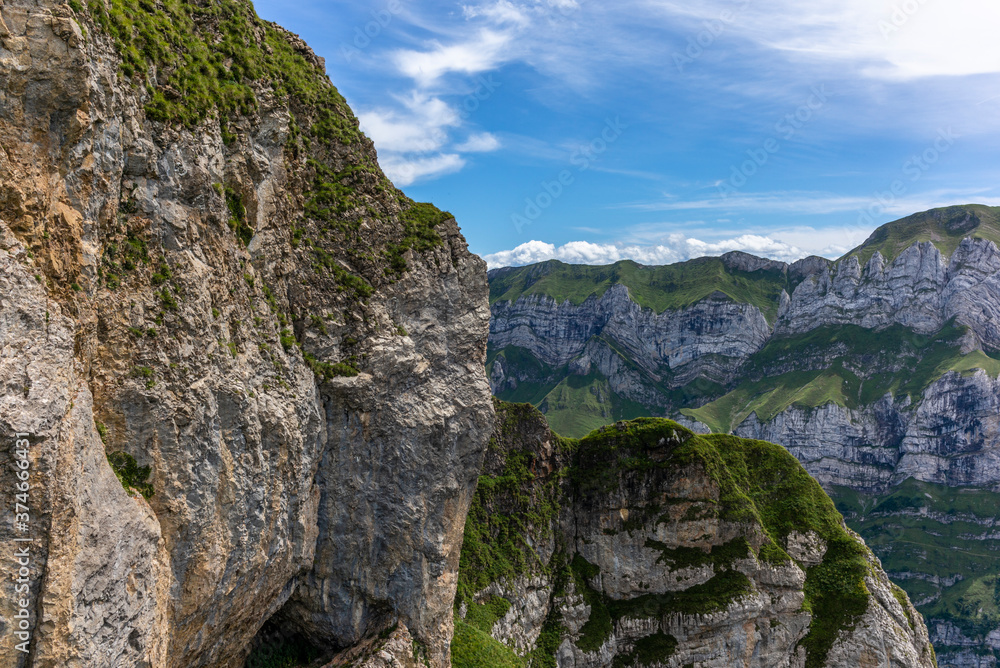 The steep ridge of the majestic Schaefler peak in the Alpstein mountain range in Appenzell, Switzerland