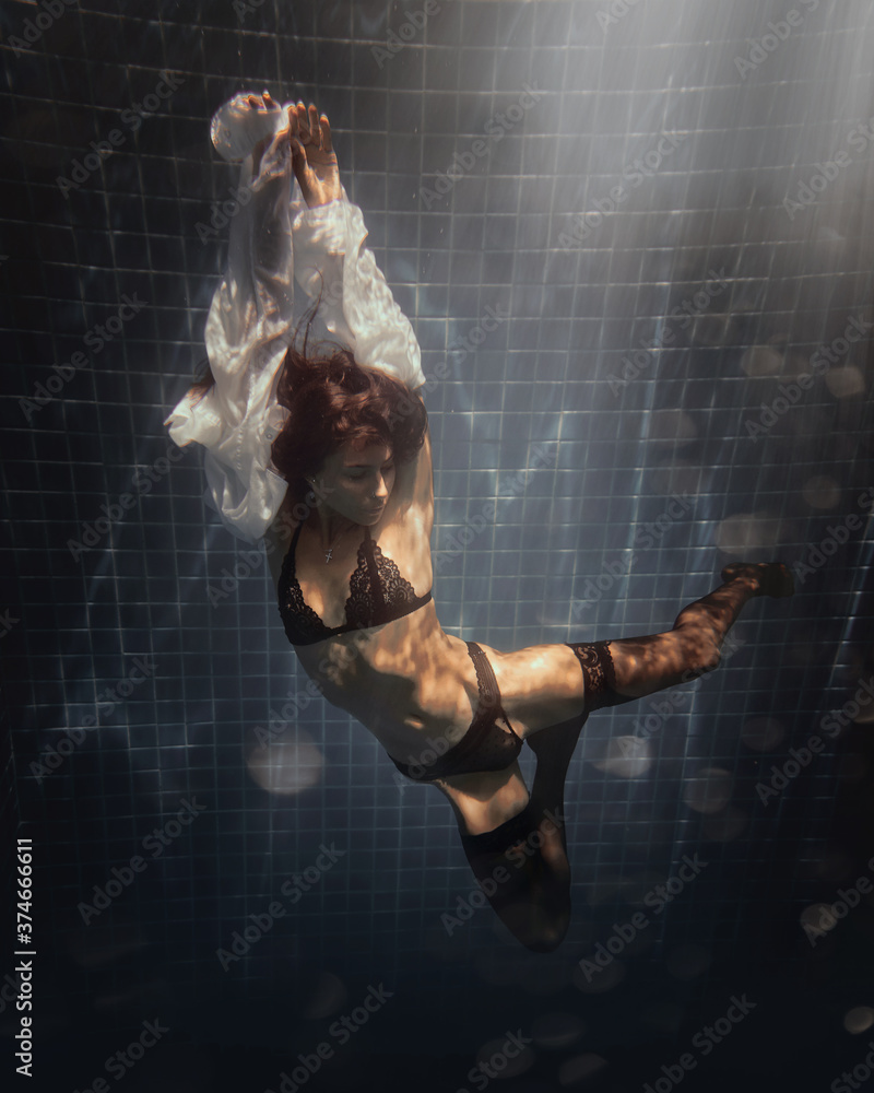 underwater girl in swimming pool