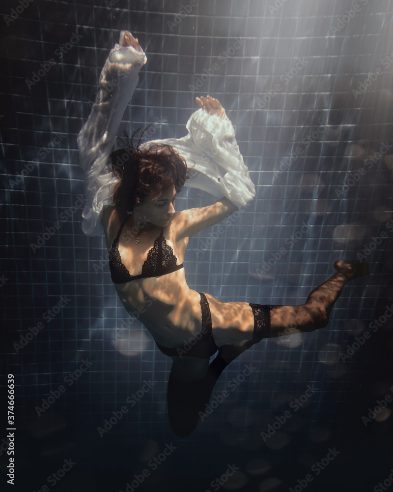 underwater girl in swimming pool