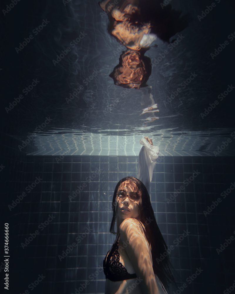 underwater girl in swimming pool