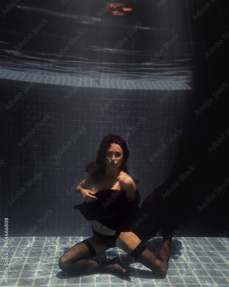 underwater girl in swimming pool
