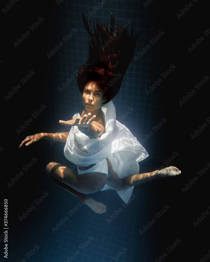 underwater girl in swimming pool