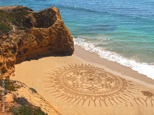 Beautiful beach mandala in Albufeira in Portugal Praia Maria Luisa