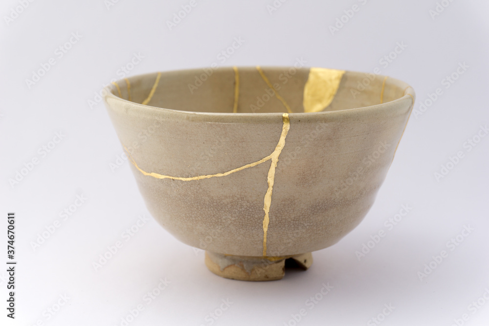 Kintsugi beige tea ceremony chawan bowl. Gold cracks restoration on old ...