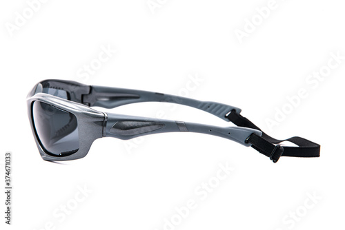 Fashion sunglasses grey frames on white background. photo