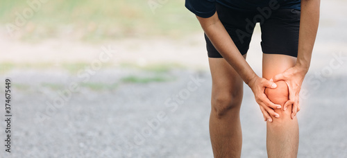 Young athletic woman with knee pain, there is copy space for background, Injury from workout concept