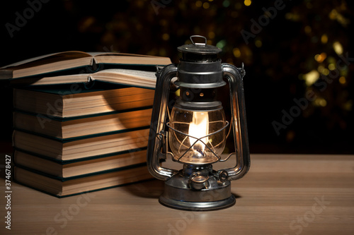 image of book lamp dark background 