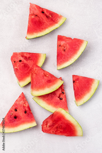 Tasty and Fresh Slices of Red Watermelon Top View Blue Background Vertical