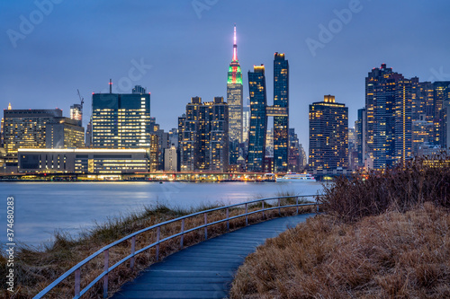 Photography Manhattan skyline with Empire State Building seen from Gantry Plaza State Park,