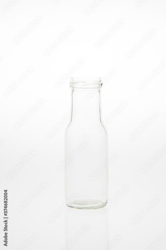 Isolated glass bottle on white background without cap. Isolated glass bottle on white background without cap.
