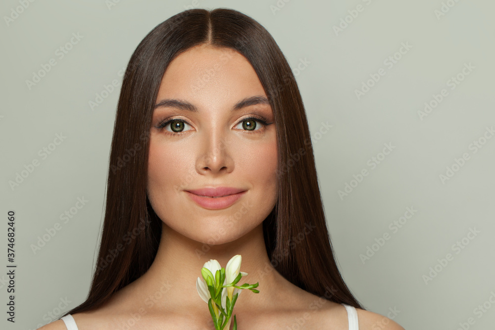 Beautiful model face. Healthy spa woman with clear skin and long healthy straight hair. Skincare and facial treatment concept Beautiful model face. Healthy spa woman with clear skin and long healthy straight hair. Skincare and facial treatment concept