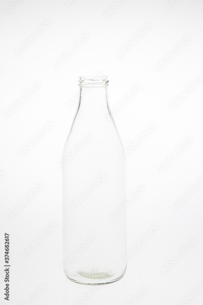 Isolated glass bottle on white background without cap. Isolated glass bottle on white background without cap.