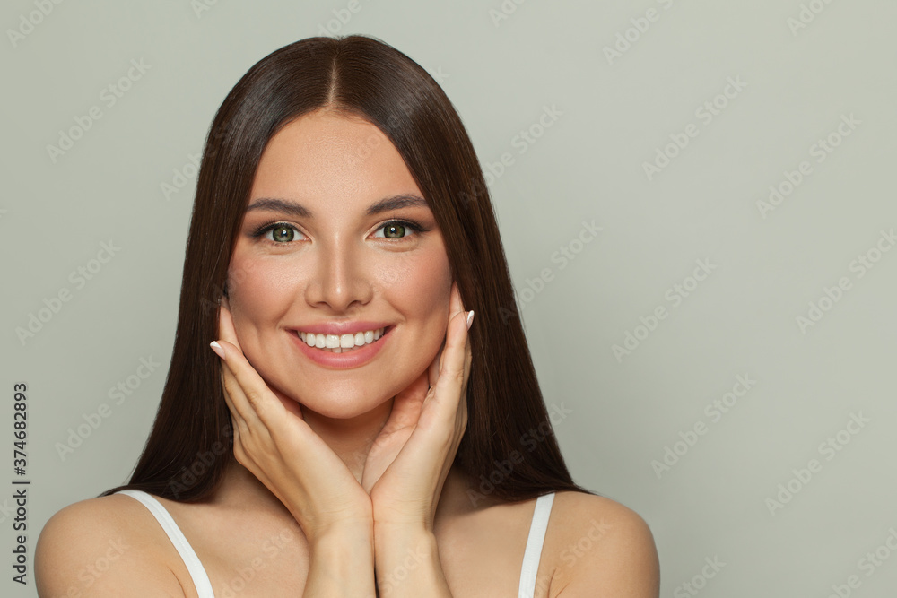 Pretty young woman spa model with clear skin and long healthy straight hair. Skincare and facial treatment concept Pretty young woman spa model with clear skin and long healthy straight hair. Skincare and facial treatment concept