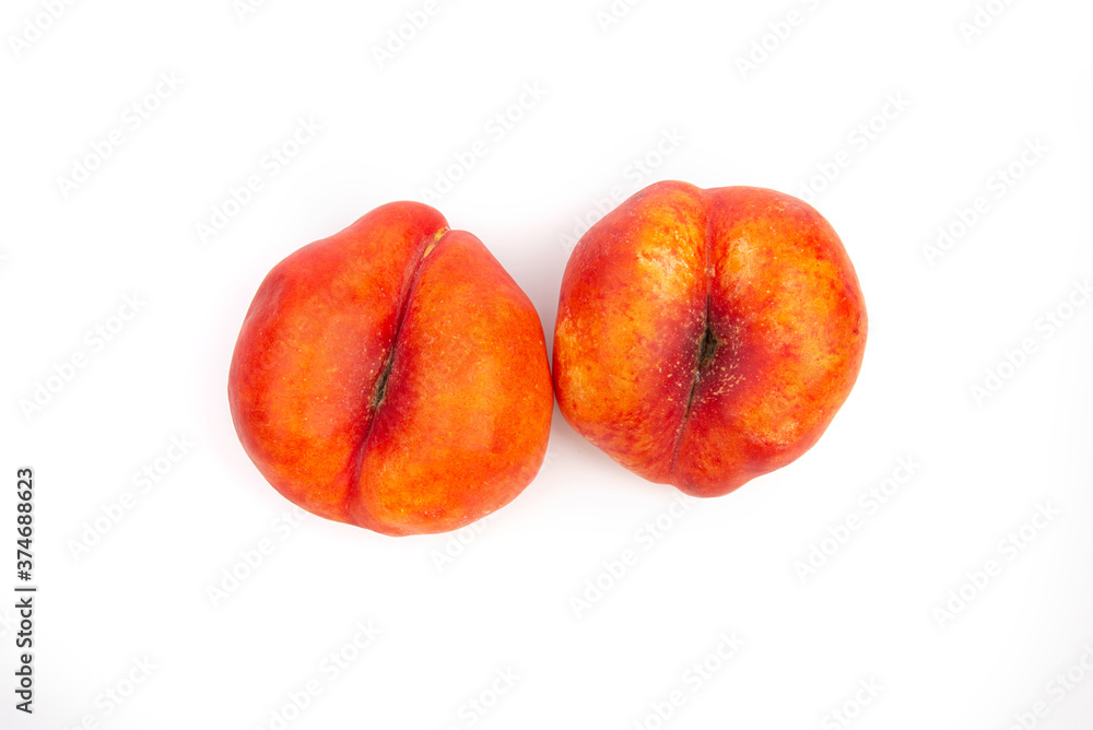 Flat peach on a white background. Top view. Flat peach on a white background. Top view.