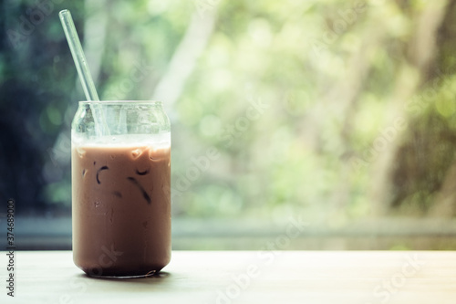 Iced coffee in glass and straw made from glass