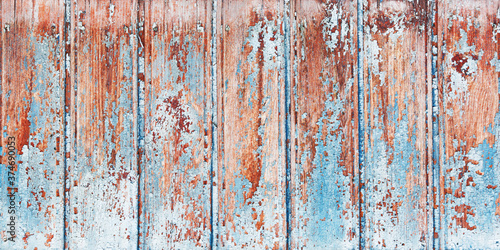 Background wooden board with cracked paint. Color-Peel wood texture © fadzeyeva