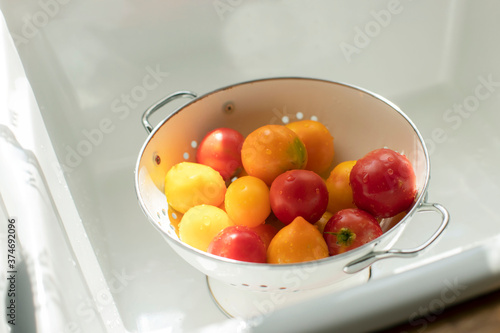 bowl of fresh tomatoes of various colors
